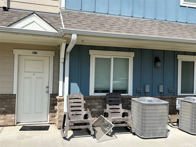 entrance to property featuring central AC