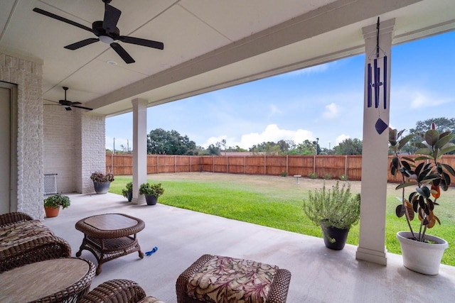 view of patio / terrace with ceiling fan and a fenced backyard