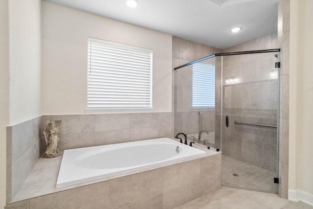 bathroom with a garden tub, recessed lighting, and a stall shower