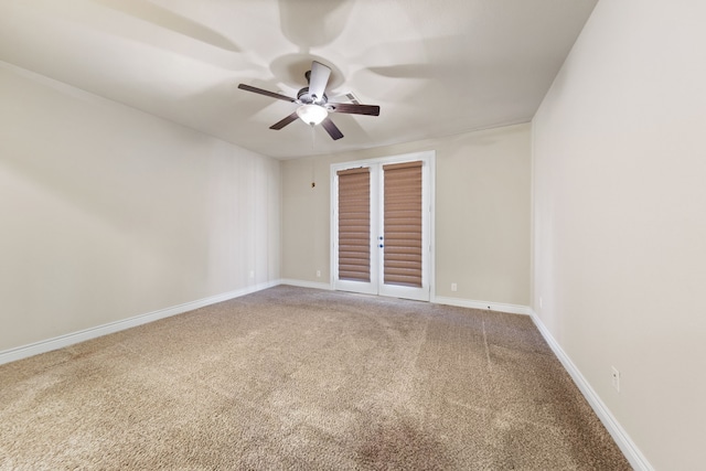 carpeted empty room with ceiling fan