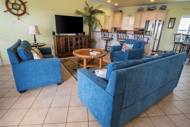 tiled living room featuring crown molding