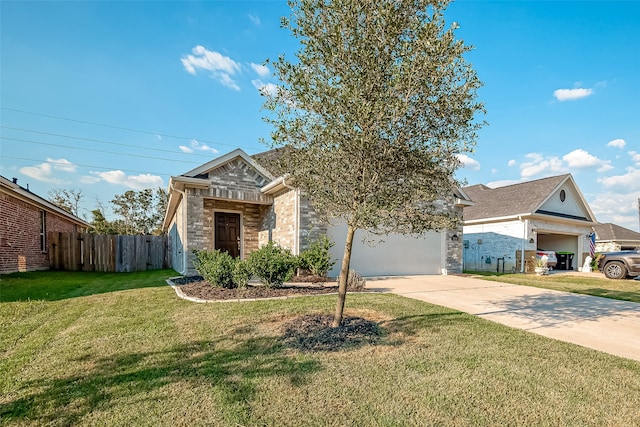 view of front of house with a garage and a front yard