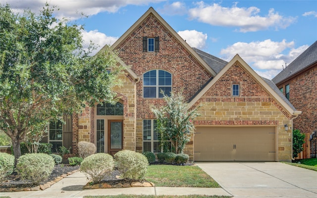 view of front of property featuring a garage