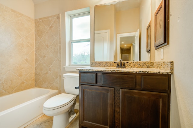 bathroom featuring tile patterned floors, vanity, and toilet