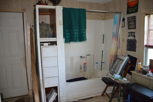 bathroom featuring shower / bath combo with shower curtain