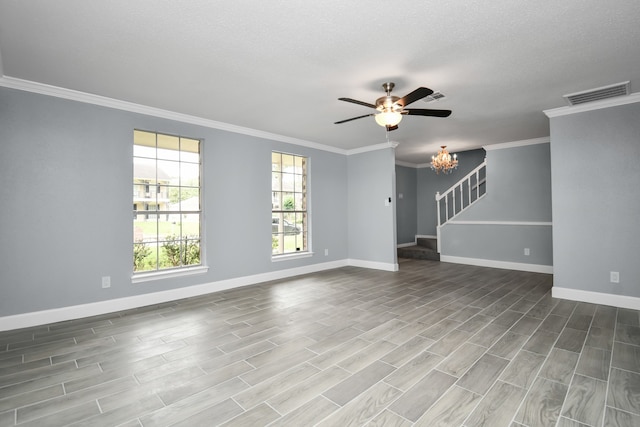 unfurnished living room with ceiling fan, ornamental molding, a textured ceiling, and hardwood / wood-style floors