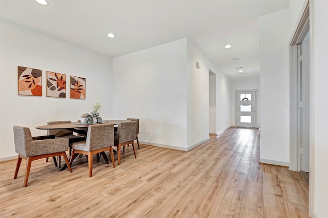 dining area with light hardwood / wood-style flooring