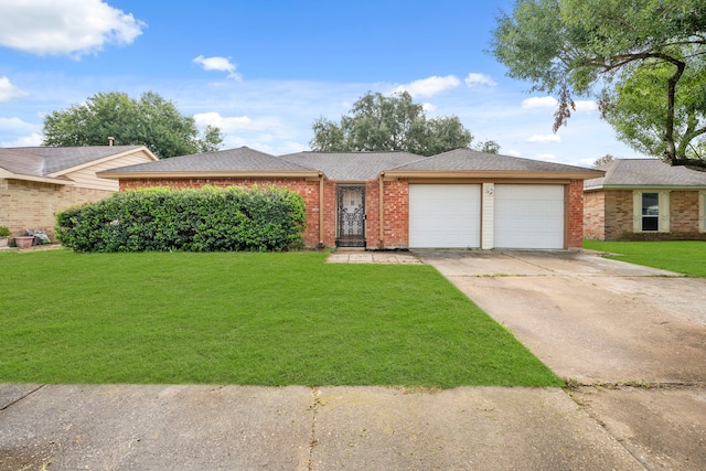 single story home featuring a garage and a front lawn