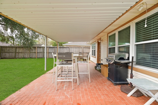 view of patio featuring a grill