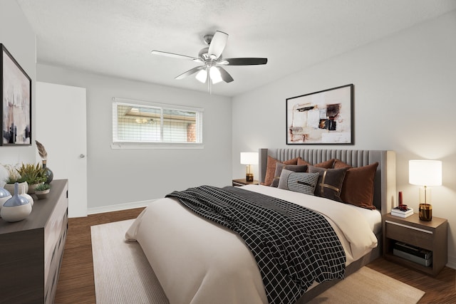 bedroom featuring ceiling fan and dark wood-type flooring