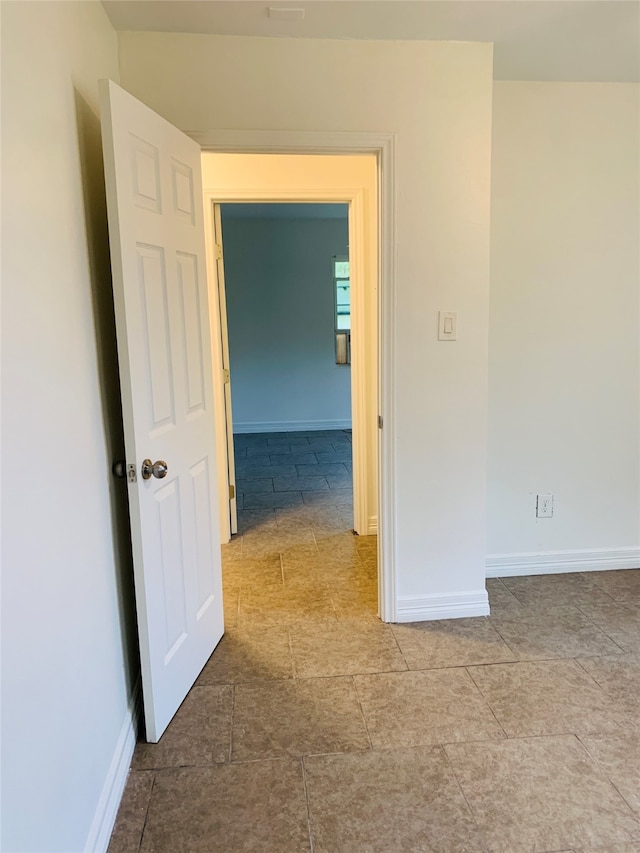 interior space with light tile patterned flooring