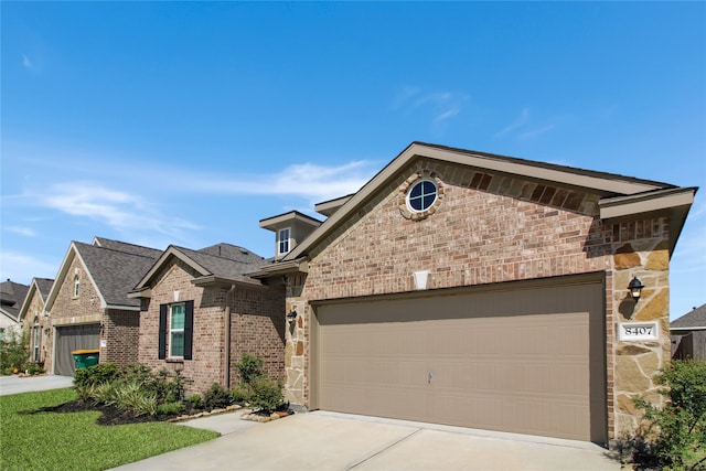 view of front of home with a garage