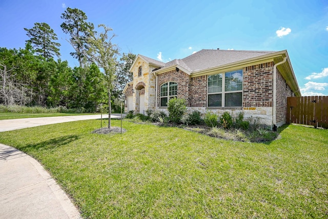 view of front of home with a front yard