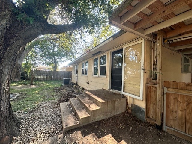 exterior space with central air condition unit