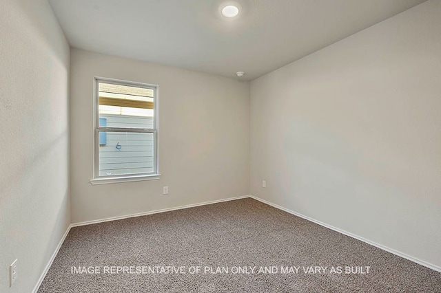 empty room featuring carpet floors