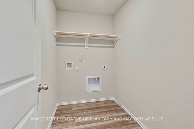 laundry area with hardwood / wood-style floors, washer hookup, gas dryer hookup, and hookup for an electric dryer