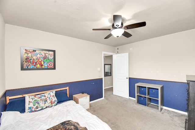 bedroom featuring ceiling fan and carpet floors