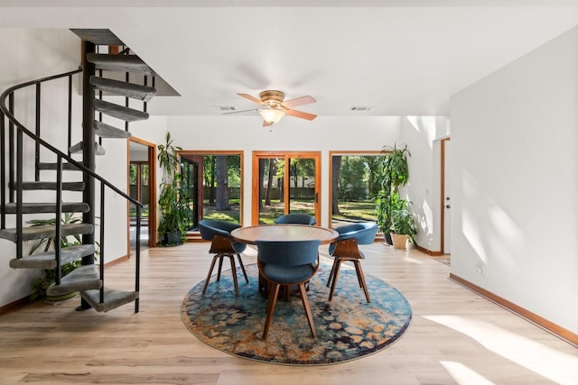 6711 River Lodge Dr, Spring, TX 77379 - dining area featuring baseboards, a ceiling fan, stairs, and visible vents