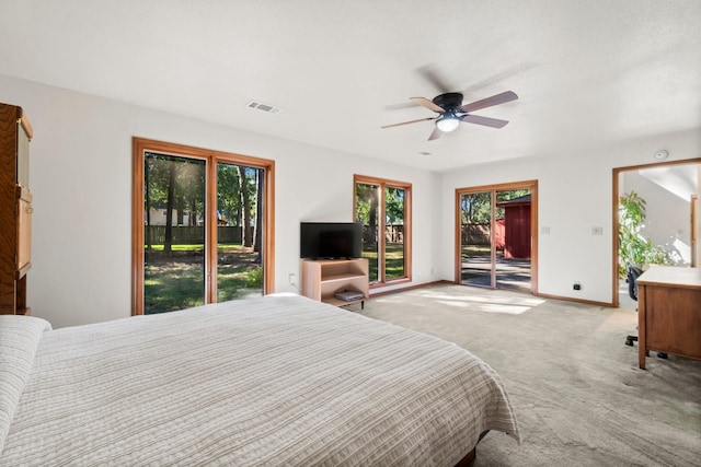 6711 River Lodge Dr, Spring, TX 77379 - bedroom featuring visible vents, light carpet, multiple windows, and access to exterior