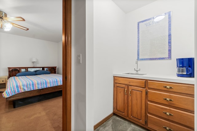 bathroom featuring vanity and ceiling fan