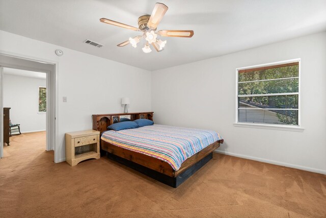 6711 River Lodge Dr, Spring, TX 77379 - bedroom featuring light colored carpet, visible vents, and multiple windows