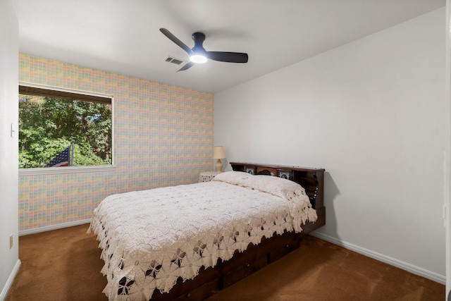 6711 River Lodge Dr, Spring, TX 77379 - carpeted bedroom featuring a ceiling fan, wallpapered walls, visible vents, and baseboards