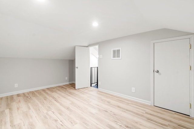 6711 River Lodge Dr, Spring, TX 77379 - bonus room with visible vents, baseboards, lofted ceiling, recessed lighting, and light wood-style flooring