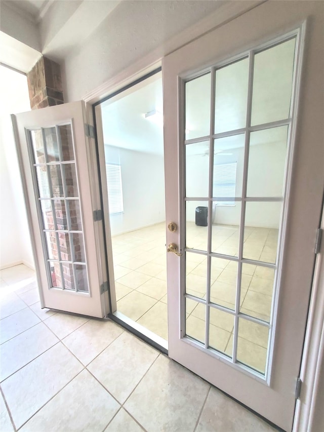 entryway featuring light tile patterned floors