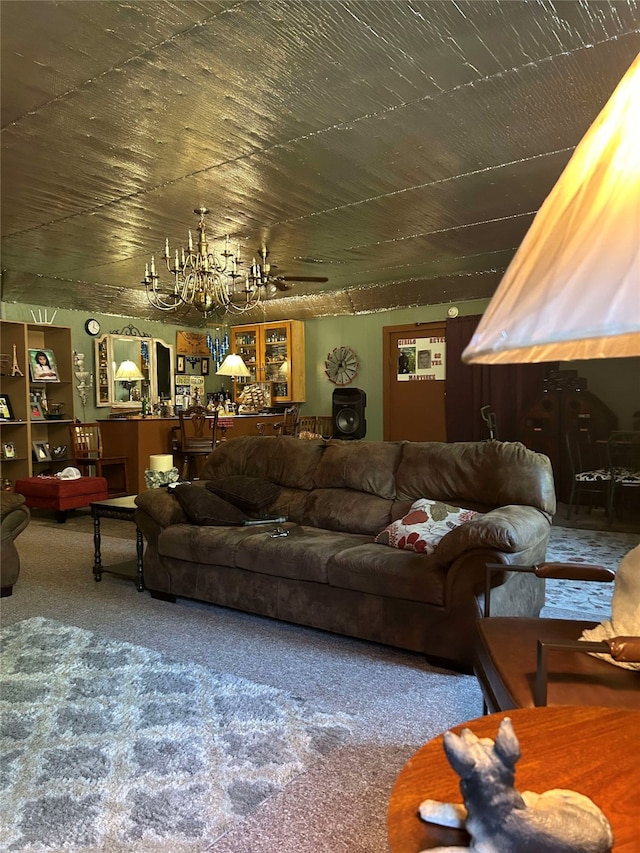 208 S Karnes Ave, Cameron, TX 76520 - carpeted living area with a chandelier