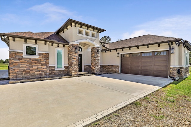 view of front of home with a garage