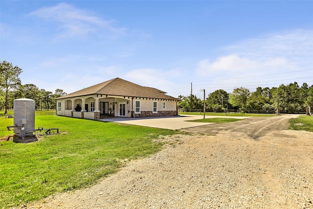 exterior space with a lawn