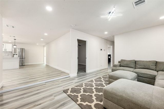 living room featuring light wood-type flooring