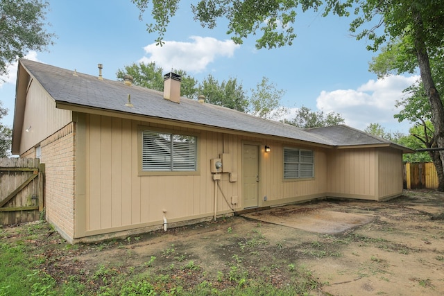 rear view of house featuring a patio area