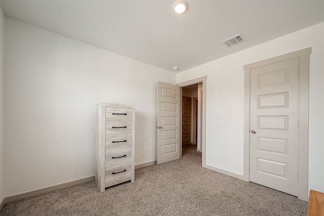 unfurnished bedroom featuring carpet