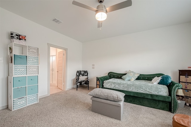 bedroom featuring ceiling fan, connected bathroom, and carpet flooring