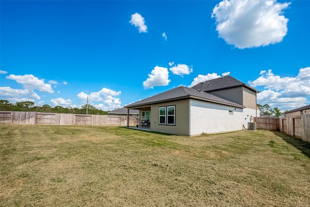 view of yard featuring central AC