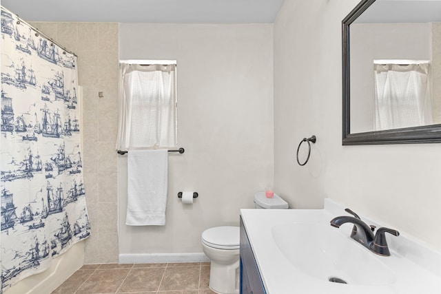 full bathroom featuring vanity, shower / tub combo, toilet, and tile patterned floors