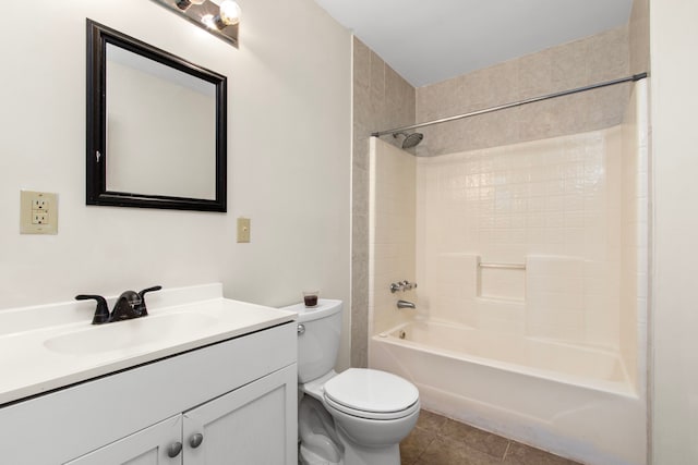 full bathroom with vanity, toilet, tile patterned floors, and tiled shower / bath