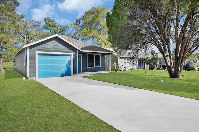 ranch-style home with a front yard and a garage