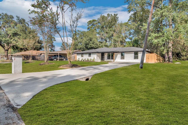 single story home with a front yard and a carport