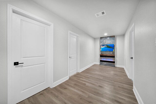 hall featuring light wood-type flooring