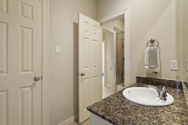 bathroom with vanity and tile patterned floors