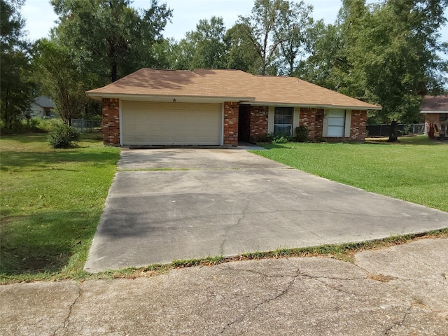 ranch-style house with a front lawn and a garage