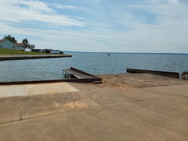 view of water feature with a dock