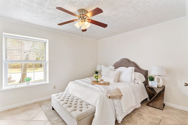 bedroom featuring light tile patterned floors, crown molding, a textured ceiling, and ceiling fan