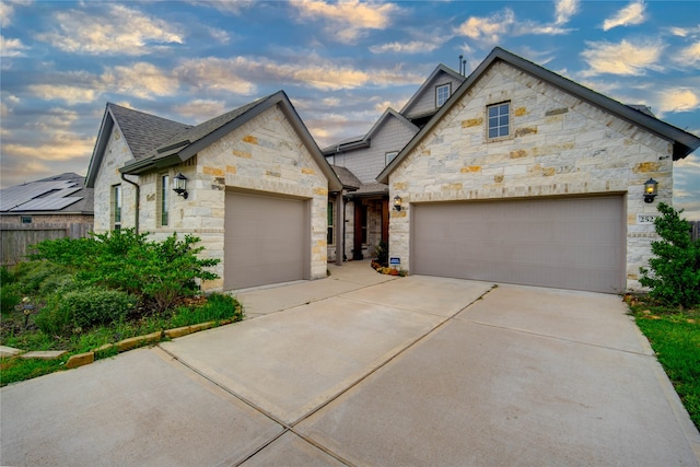 view of front of property featuring a garage