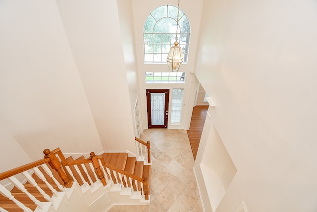 entryway featuring a high ceiling