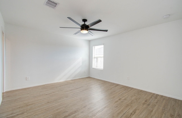 unfurnished room featuring ceiling fan and light hardwood / wood-style flooring