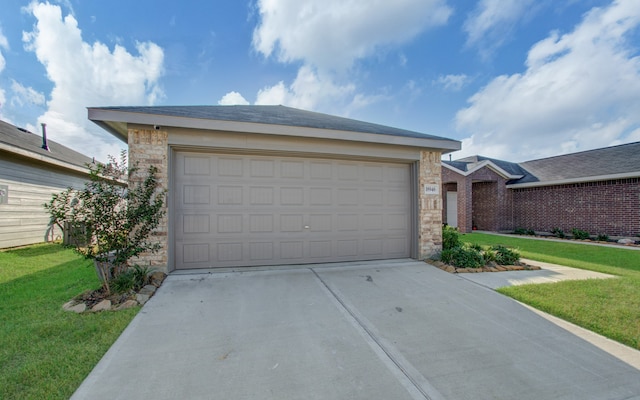 garage with a yard