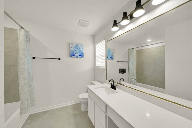 bathroom with tile patterned flooring, a shower with curtain, vanity, and toilet